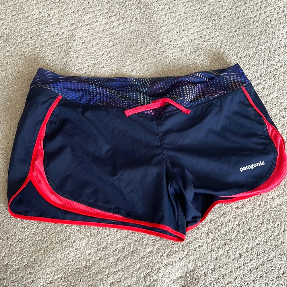 Patagonia athletic shorts size medium in women's- navy and red trim